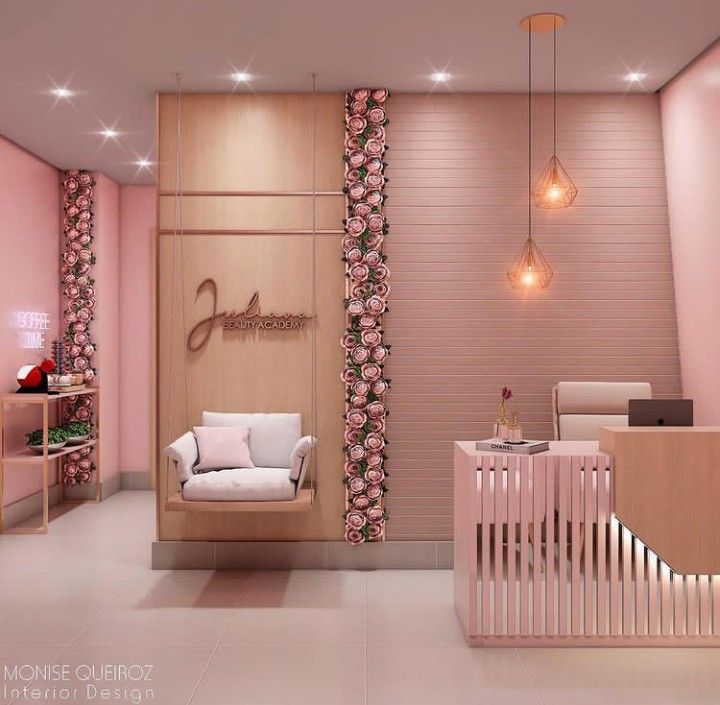 a baby's room with pink walls and white furniture