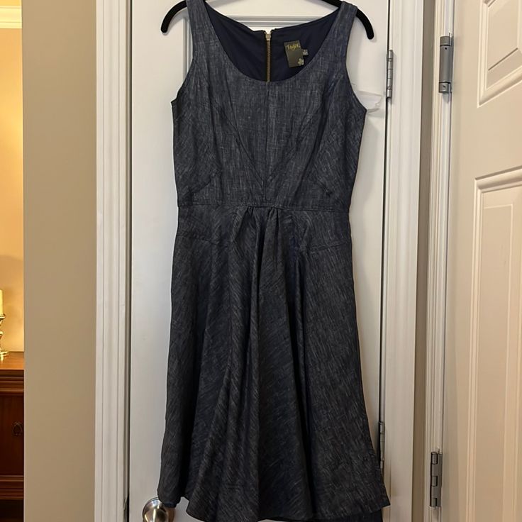 Denim Sleeveless Dress. Size 4. The Bottom Of The Dress Has A Bias Cut. Medium Wash Color And Soft Fabric. Fitted Sleeveless Denim Dress For Casual Wear, Sleeveless Cotton Denim Dress, Spring Sleeveless Denim Dress For Casual Wear, Chic Dark Wash Sleeveless Dress, Elegant Sleeveless Denim Dress, Fitted Sleeveless Dark Wash Dress, Elegant Sleeveless Denim Dress For Summer, Elegant Sleeveless Summer Denim Dress, Chic Sleeveless Dark Wash Dress