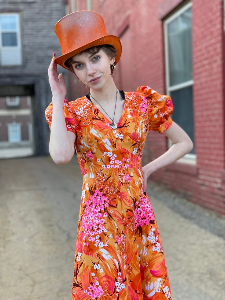 "Extreme Bight Mood Puff Sleeve 70s Hawaiian Print Orange and Pink Spring Maxi Dress. Here comes the sun. In excellent condition with no flaws of note. No tags. Feels synthetic. Back vinyl zip with hook and eye at neck. So beautiful Bust 31\" Waist 24\" Hip 36\" Length 49\" Please message me with questions before purchasing. All sales are final and ship fast from the Vermont shop. Find us on Instagram @anasclosetfullofcolor Thankyou! More vintage dresses here: https://www.etsy.com/shop/anastasia Retro Fitted Dress For Vacation, Fitted Bohemian Vintage Dress With Short Sleeves, Fitted Retro Vacation Dress, Vintage Summer Dress With Retro Print, Vintage Short Sleeve Dress For The Beach, Vintage Short Sleeve Dresses For Vacation, Vintage Fitted Dress For Vacation, Hawaiian Fitted Short Sleeve Dress, Hawaiian Short Sleeve Spring Dresses