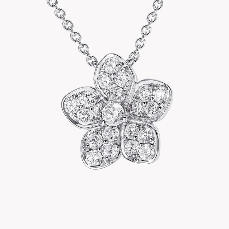 High jewellery craftsmanship meets contemporary style in our Wild Flower necklace. Joyful and uplifting, diamonds flourish in rare abundance upon the lifelike petals, which unfurl with extraordinary lightness, like flowers freshly bloomed. The Wild Flower collection is an invitation to escape into a garden that grows just for you. From trios and individual blooms to floral clusters and blossoms laid out in a row, each Wild Flower jewel is a statement of delicacy and of empowerment, designed to b Large Diamond Stud Earrings, Triple Diamond Ring, Double Diamond Ring, Large Diamond Rings, Flower Diamond Ring, Pave Diamond Earrings, High Jewellery, Flower Collection, Platinum Jewelry