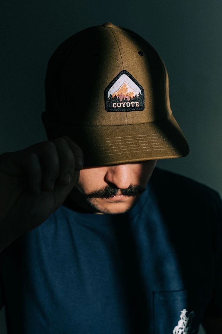 We think we found the perfect hat for a hike, tour, setting up camp or hitting the road. A six panel mid profile cap made of tough ripstop cotton, with our custom Coyote Mountain embroidered patch. Made for roaming and wandering.  Cotton ripstop fabric Mid crown Nylon weave adjustable strapback Slightly curved bill We Outdoor Cotton Hat With Embroidered Patch, Cotton Hats With Embroidered Patch For Outdoor, Baseball Cap Photoshoot, Brown Six-panel Hat For Outdoor Activities, Curved Brim Hat With Logo Patch For Camping, Camping Hat With Curved Brim And Logo Patch, Camping Hat With Logo Patch And Curved Brim, 5-panel Camping Hat With Logo Patch, Snapback Baseball Cap With Logo Patch For Camping