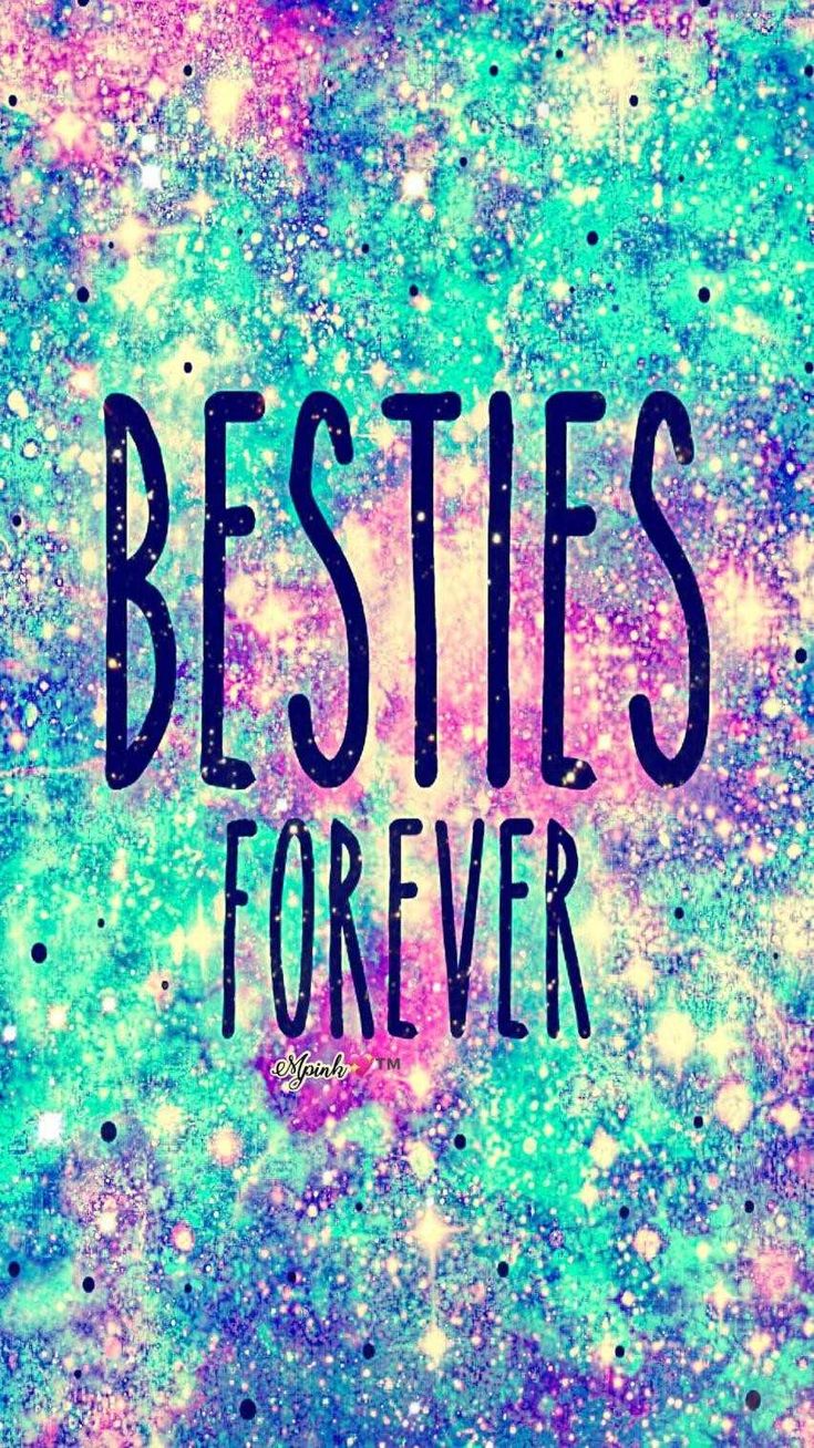 the words besties forever written in black ink on a blue and green galaxy background