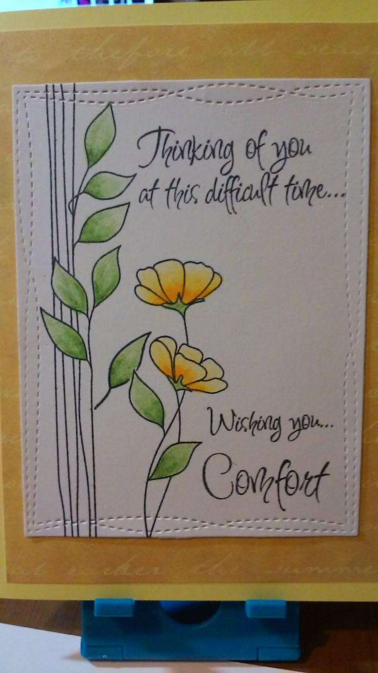 a card with some flowers on it that says thinking of you at this difficult time