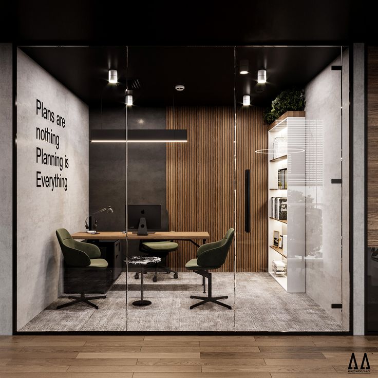 an office with glass walls and wooden paneling on the wall, along with two green chairs