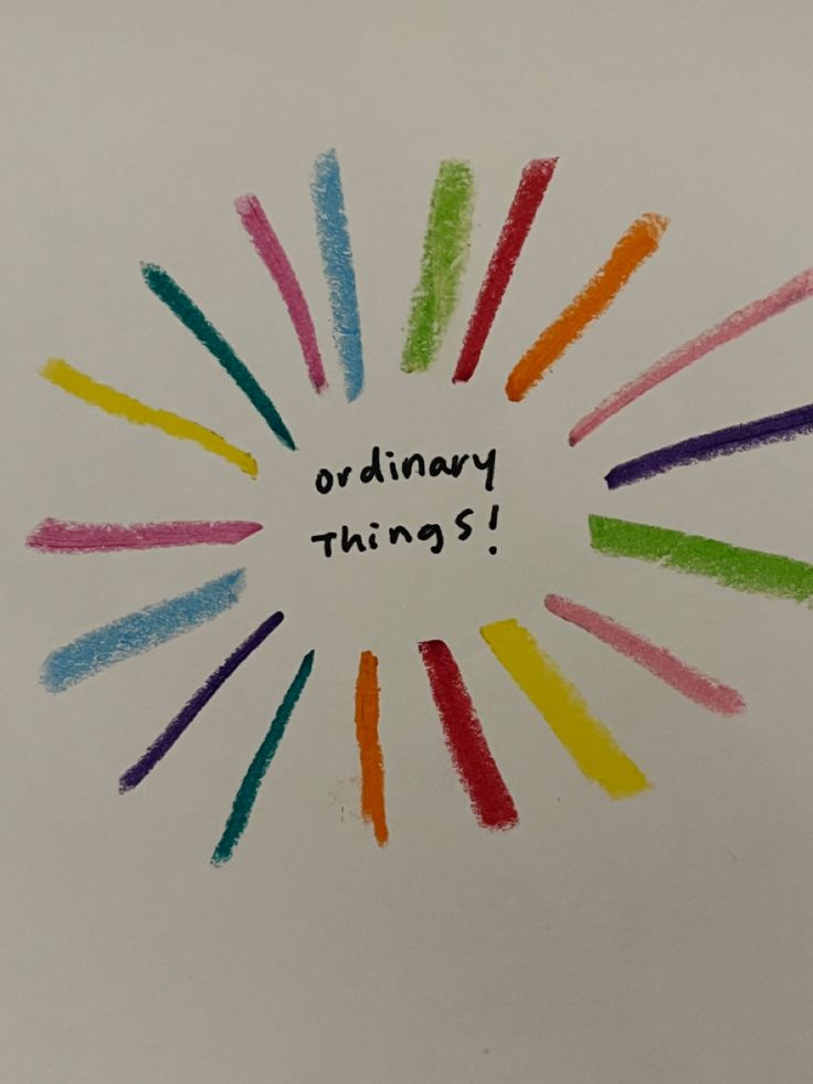 the words ordinary things written in colored crayon pencils on a white paper