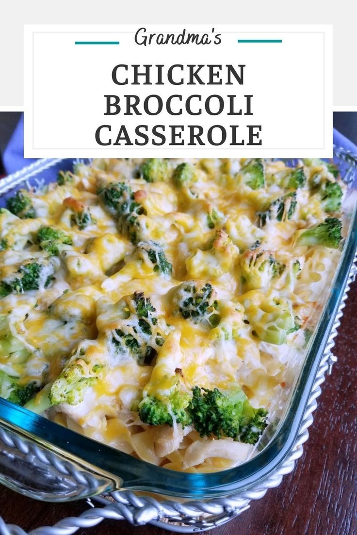 a casserole dish with broccoli and cheese in it on a wooden table