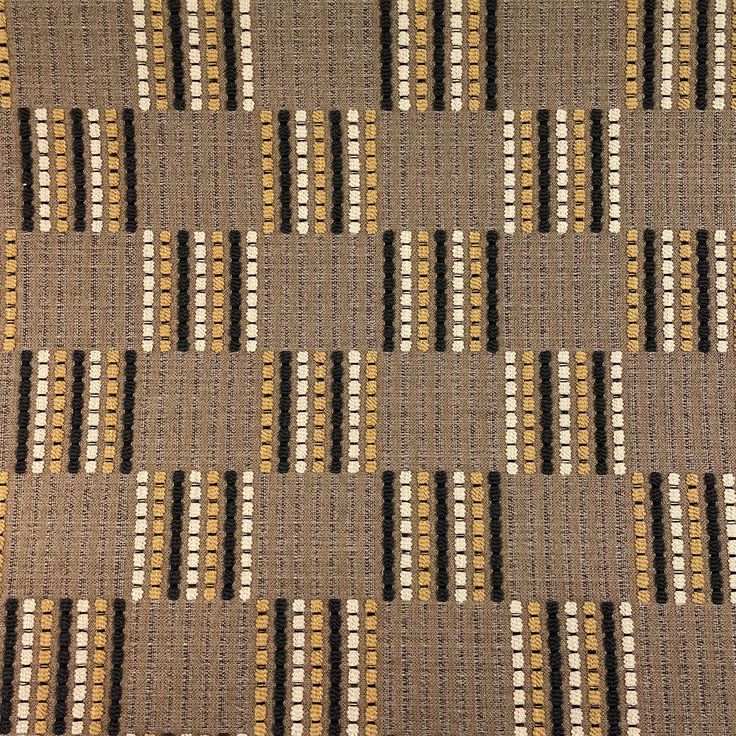 a brown and white checkered pattern on fabric