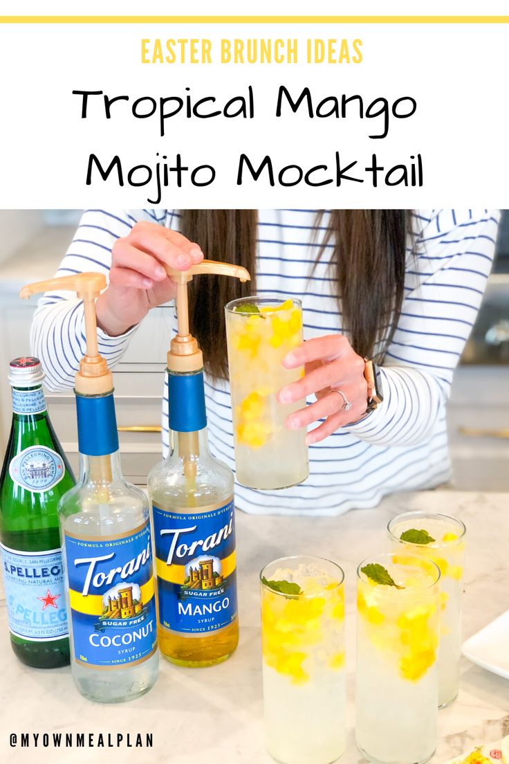 a woman is making a mojito cocktail in front of bottles and glasses on the counter