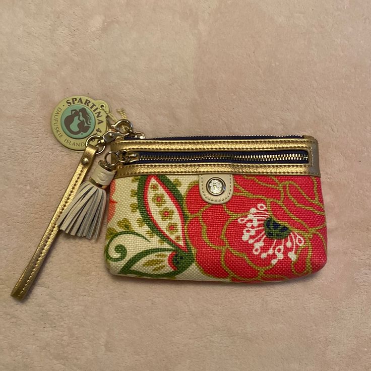 Spartina Carson Cottage Tassel Wristlet. 71/2” X 5”. Pink Wristlet For Everyday Use In Spring, Spring Zipper Pouch Wristlet Clutch, Rectangular Wristlet For Spring Gift, Rectangular Wristlet As Spring Gift, Rectangular Wristlet Gift For Spring, Pink Spring Wristlet, Pink Pouch Wristlet For Spring, Spring Pouch Wristlet With Zipper Closure, Spring Pink Pouch Wristlet