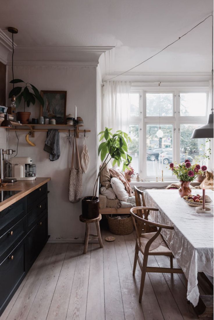 the kitchen is clean and ready to be used as a dining room or breakfast nook