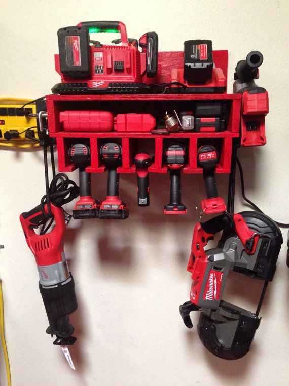 the tools are organized neatly and ready to be put into storage bins on the wall