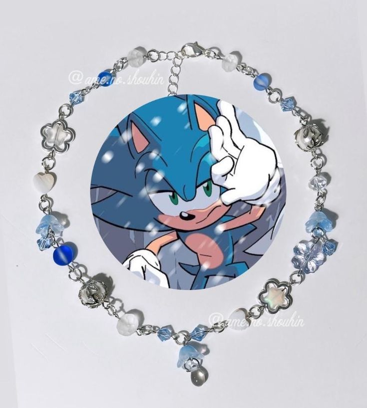 Embrace your love for adventure with this vibrant charm necklace inspired by the iconic Sonic the Hedgehog. Featuring a delightful array of colorful glass beads, each one artfully strung together with sleek silver links, this necklace captures the spirit of speed and fun. Charm Necklaces, The Hedgehog, Colored Glass, Festival Season, Sonic, Halloween Shopping, Sonic The Hedgehog, Charm Necklace, Beauty Book