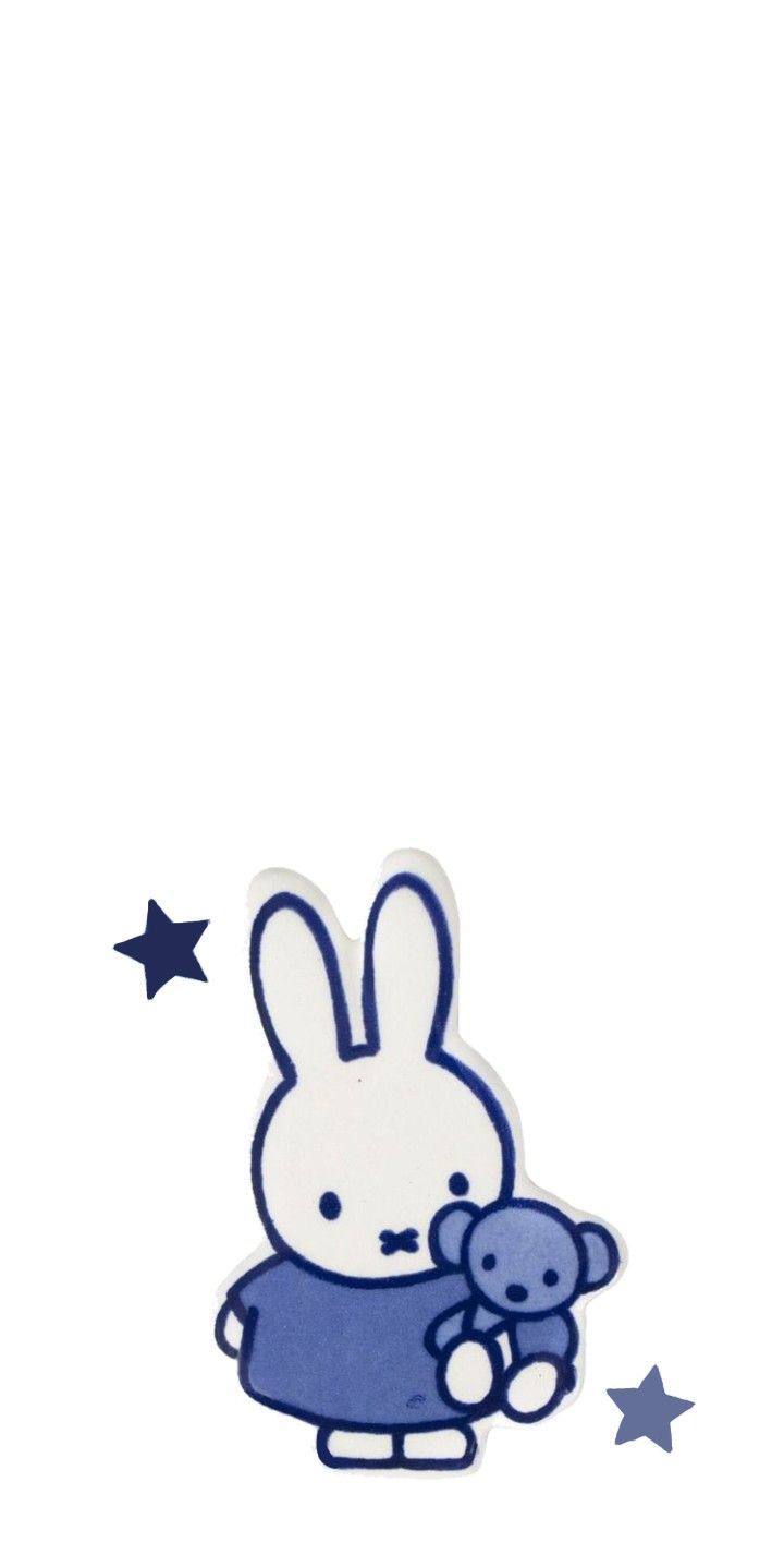 a white rabbit holding a blue teddy bear in it's lap with stars on the side