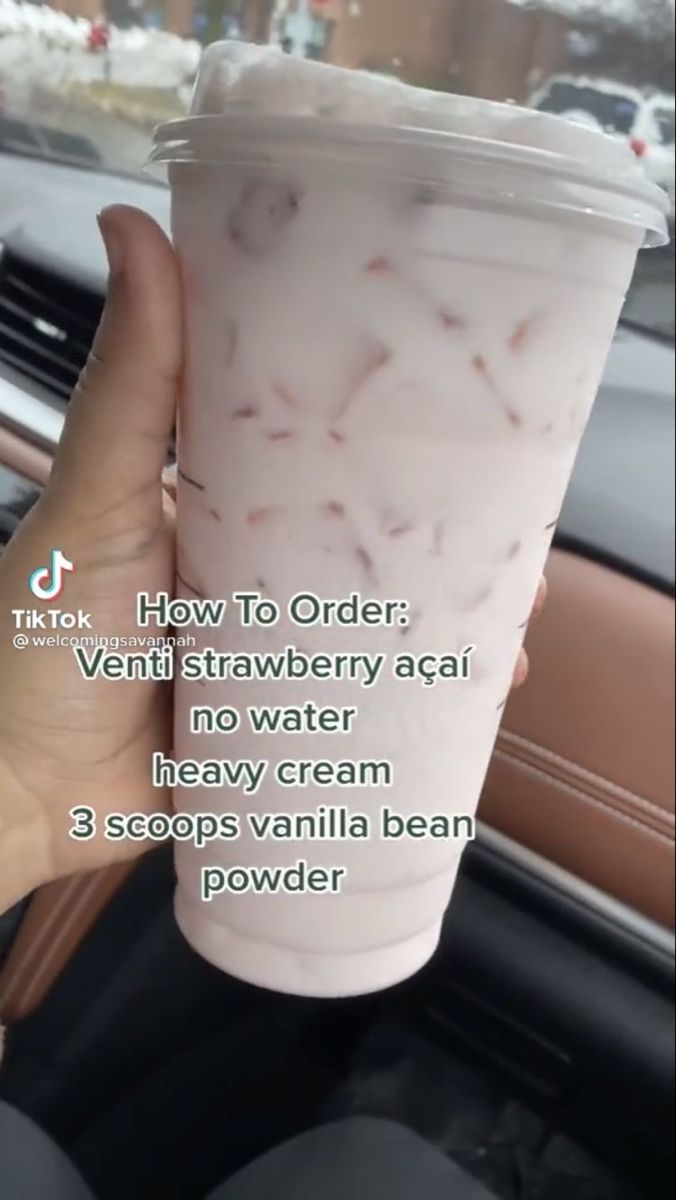 a person holding up a cup of ice cream in their hand with instructions on how to order