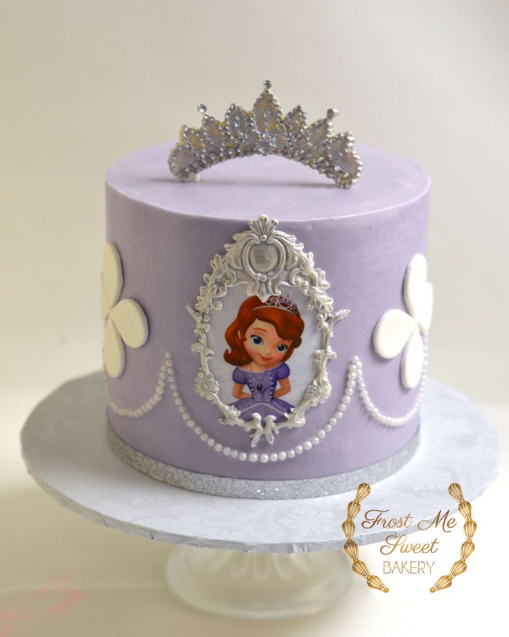 a purple princess cake with a tiara on top