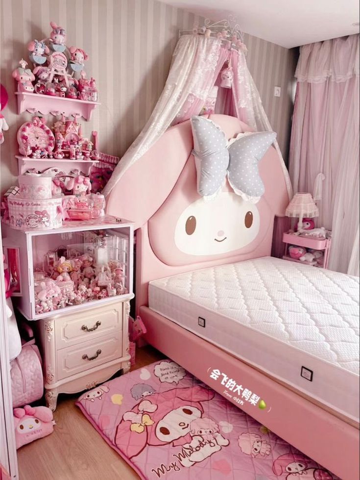 a bedroom with pink furniture and accessories in the shape of an animal, is shown