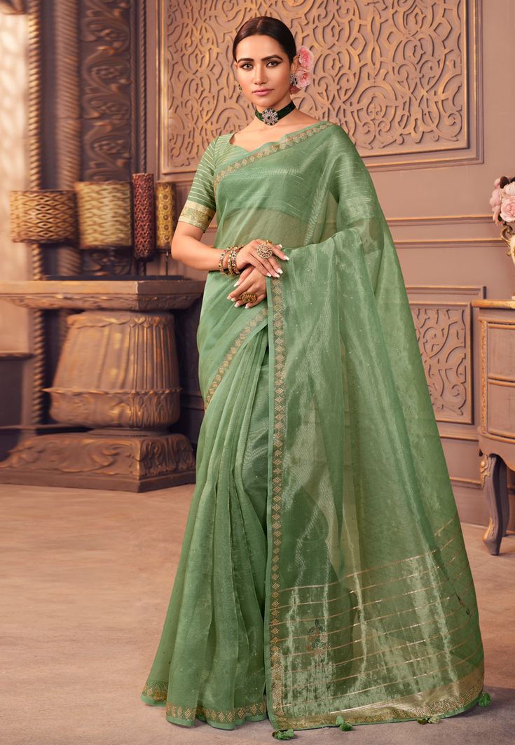 Organza Saree with blouse in Sea green colour 1207  Desc:  Color : Sea Green Fabric : Organza Work : Embroidery Wash Care : Dry clean Sleeve Style : Half Sleeve Long Sleeves : Done only in Custom Stitch Sleeves Lining : Done only in Custom Stitch Bust Size : 32 to 42 Inches Occasion : Temple Wear   Social Gathering   Pongal   Gudi Padwa   Onam   Ugadi. With Express Free Shipping and Custom Stitching, Buy Indian Party wedding wear Bridal Sarees Organza Saree with blouse in Sea green colour 1207 o Green Anarkali Chanderi Blouse Piece, Green Saree Blouse With Zari Weaving, Green Anarkali Art Silk Blouse, Green Art Silk Anarkali Blouse, Bollywood Green Blouse With Zari Weaving, Elegant Green Blouse With Zari Weaving, Green Anarkali Blouse Piece For Eid, Green Blouse With Resham Embroidery For Wedding, Green Anarkali Blouse For Eid