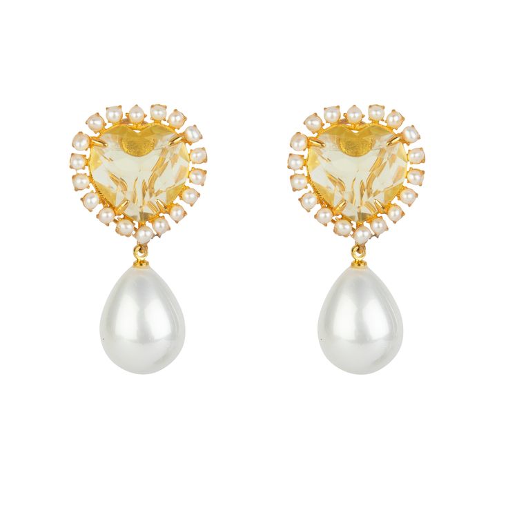 The handcrafted classic earrings are adorned with lemon quartz, Mother of Pearl, accented by white shell pearl drop. Our pieces are crafted with 14K Gold Plated Brass, which is selected for its structural integrity, and higher durability over its silver alternatives – ensuring our delicate designs are crafted with as much strength as possible. SKU: ED-HT-10 Lemon Quartz, Mother of Pearl & Sea Shell Pearl Semi-precious Stones Convertible 2-ways Made to Order Measures 1 7/8" x 1" Material: 14K Gol Elegant Heart-shaped Clip-on Earrings For Party, Elegant Gold Clip-on Heart Earrings, Elegant Heart Shaped Clip-on Earrings For Party, Heart-shaped Clip-on Earrings For Formal Occasions, Heart Shaped Clip-on Earrings For Formal Occasions, Elegant Clip-on Heart Earrings For Anniversary, Elegant Clip-on Heart Earrings, Elegant Heart-shaped Clip-on Earrings, Elegant Heart-shaped Clip-on Jewelry