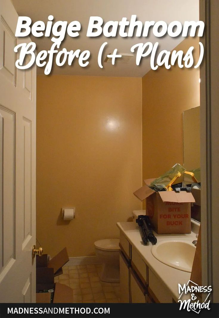 a bathroom with the door open and boxes on the counter