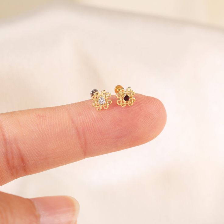 Metal: 14K solid gold, Not Plated or Gold Filled Available Gold color: Yellow gold  Stone: Garnet/Moissanite Thickness: 0.82mm (20G) , 1.0mm (18G), 1.2mm (16G) Stamp: 14K on top or 14K gold back, no stamp on titanium back, ★Sold as single piece ★Threadless Push Pin (Flat Back) ★ We have two different materials of Push back for you choose: ● One is 14K solid gold with length : 6mm(standard), 8mm, 10mm (long)  ● Another is implanted grade titanium push back in size 5mm(short) 6mm 8mm and 10mm(long Gold Dainty Cubic Zirconia Cartilage Earrings, Dainty Gold Cartilage Earrings With Cubic Zirconia, Gold Cubic Zirconia Piercings For Gift, Yellow Gold Cubic Zirconia Cartilage Earrings For Gift, Gold Plated Pierced Cartilage Earrings For Anniversary, Dainty Yellow Gold Piercings With Cubic Zirconia, Dainty Yellow Gold Cubic Zirconia Piercings, Delicate Gold Cubic Zirconia Cartilage Earrings, Gold Sterling Silver Piercings With Prong Setting