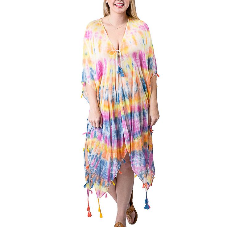 Vibrant Tie-Dye One Size Cover-Up in a longer length -perfect for lounging at the beach or pool. Tassel details make it whimsical and flirty. Wear with your favorite hat and shades. Details & Care One Size 100% Cotton 39.5"L x 35.5" W Hand wash. Dry flat. Imported Hippie Style Cover-up For Spring Beach Party, Hippie V-neck Beach Season Cover-up, Free Size Summer Tops For Beach, Tie Dye V-neck Top For Beach, Spring Vacation Tie-dye Swimwear, Summer Multicolor Short Sleeve Cover-up, Tie Dye Swimwear For Spring Vacation, Spring Vacation Tie Dye Swimwear, Multicolor Short Sleeve Summer Cover-up