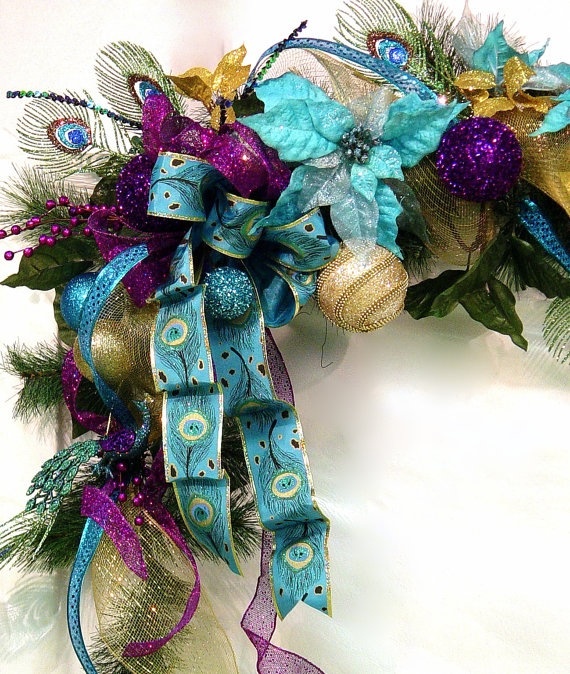 a wreath with blue, purple and gold decorations