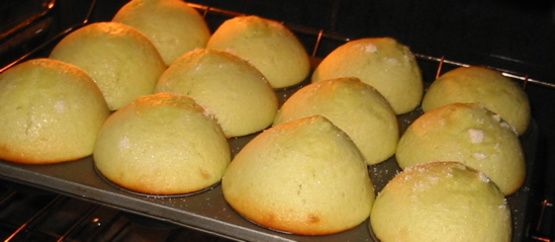 nine buns sitting in an oven ready to be baked