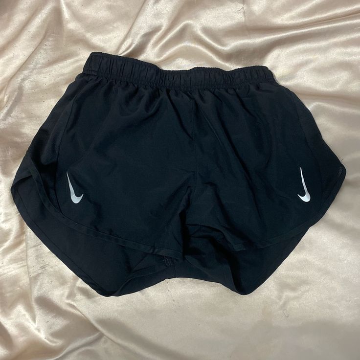 Black Nike Shorts Never Worn! Size Medium Black Bottoms For Summer Workout, Nike Black Bottoms With Built-in Shorts, Nike Black Athletic Shorts With Built-in Shorts, Nike Black Athletic Shorts With Elastic Waistband, Nike Black Athletic Shorts For Workout, Black Stretch Nike Bottoms, Nike Black Stretch Bottoms, Nike Black Gym Shorts, Nike Black Workout Shorts