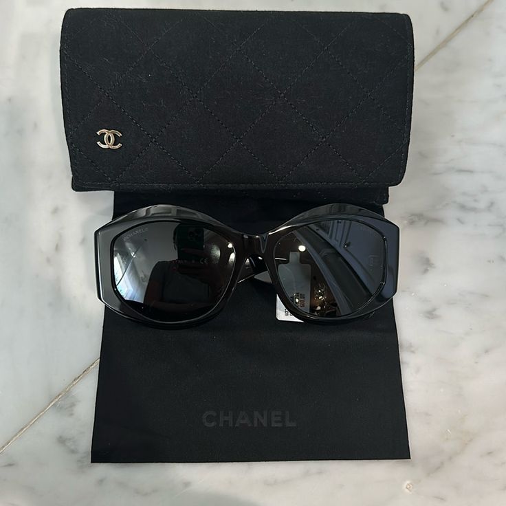 Authentic Chanel Sunglasses From Their Latest Collection. Comes With Original Case And Dust Cloth. Please See My Email That I Provided For Proof Of Purchase Directly From Chanel.Com. Oval Sunglasses Acetate Black Frame. Grey Gradient Lenses. Luxury Black Sunglasses For Travel, Elegant Travel Sunglasses With Mirrored Lenses, Elegant Mirrored Sunglasses For Travel, Elegant Glass Sunglasses For Travel, Elegant Formal Sunglasses With Uva Protection, Chanel Chain, Y2k Sunglasses, Sunglasses Logo, Sunglass Chain