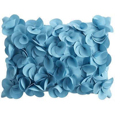 a blue pillow with flowers on it