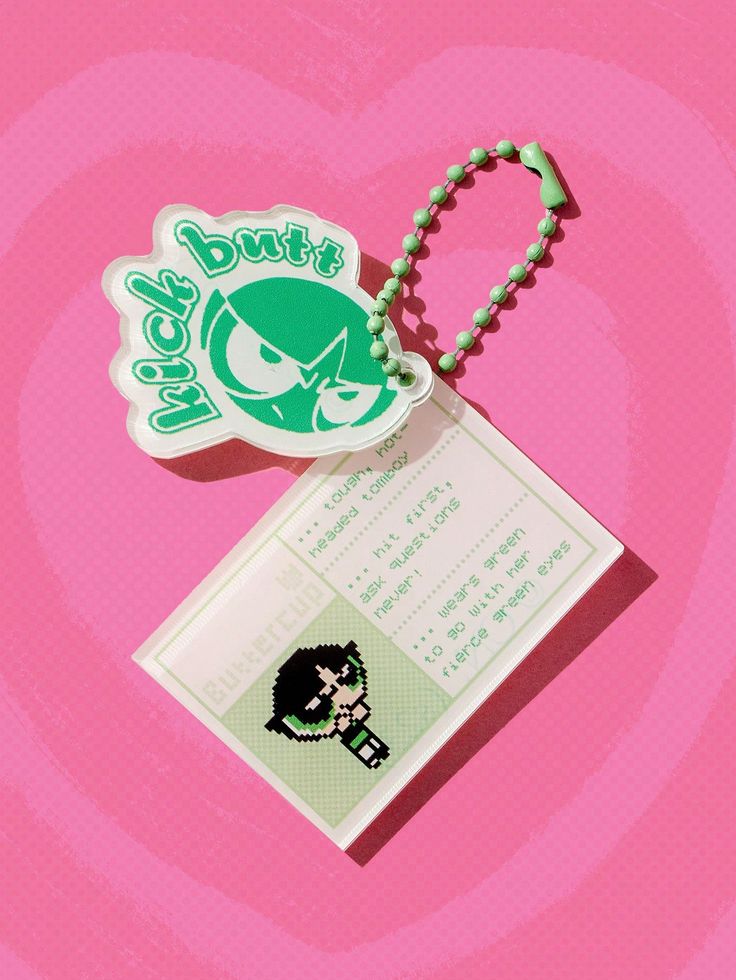 a keychain with a tag attached to it on a pink background that says, don't touch my butts