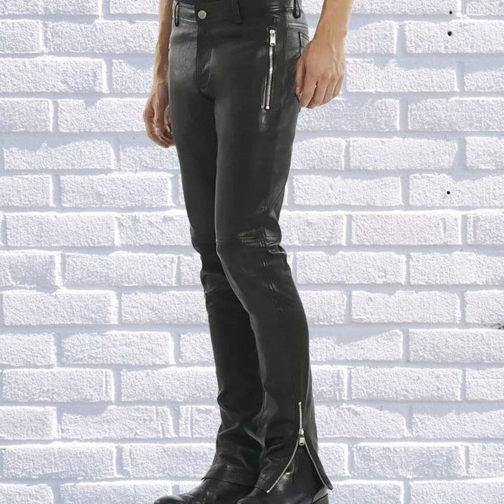 A high-quality genuine leather pant is a must in every men wardrobe. You can find real leather jackets for men at Leather Rend at very affordable prices. If you feel a little creative or know exactly what you want, you can even design your own leather pants online @Leather trend , we are all about customization any design of your choice also . We want you to feel at the top of the world whenever you are wearing one of our appealing and stylish leather Pants for men. FEATURES *OUTSIDE MATERIALS: 100% Lambskin Genuine Leather. *INSIDE MATERIALS: Premium Satin linings. *HARDWARE: Hand Polished Metal hardware. FEATURES 1.DO NOT WASH AND TUMBLE DRY OR DRY CLEAN. 2.DO NOT IRON. 3.CLEAN IN PROFESSIONAL LEATHER CARE CENTRE. Fitted Leather Bottoms With Zip Fly, Fitted Faux Leather Punk Pants, Fitted Full Length Leather Pants For Streetwear, Fitted Leather Punk Bottoms, Punk Style Leather Pants For Streetwear, Fitted Faux Leather Biker Pants, Punk Style Fitted Leather Bottoms, Fitted Leather Moto Bottoms, Fitted Punk Leather Bottoms