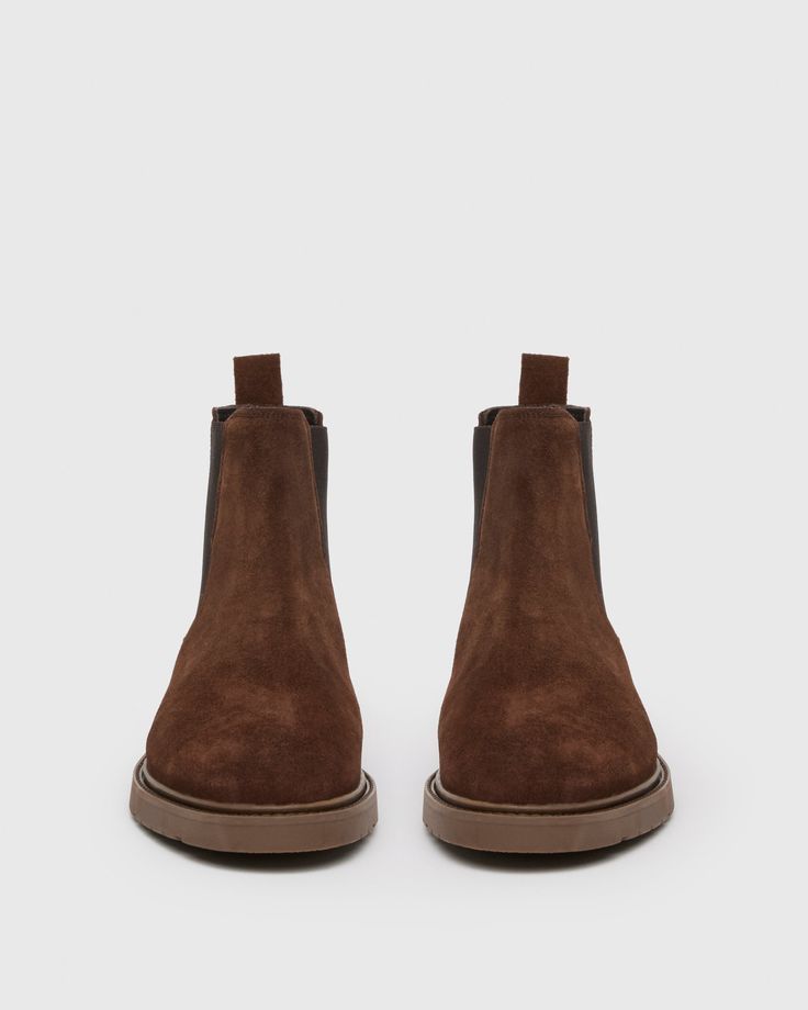 Holzer is our take on the classic Chelsea boot. Expertly crafted from soft chocolate brown suede, this versatile pair is designed with tonal elastic gore, a rubber outsole, and an extended leather welt with stitch detailing. This style features leather pull-tabs at the back for easy on and off and a removable padded insole for all-day comfort. Men Store, Denim Shoes, Leather Pulls, Chocolate Brown, Brown Suede, Chelsea Boots, Chelsea, Shoes Mens, Shoe Accessories