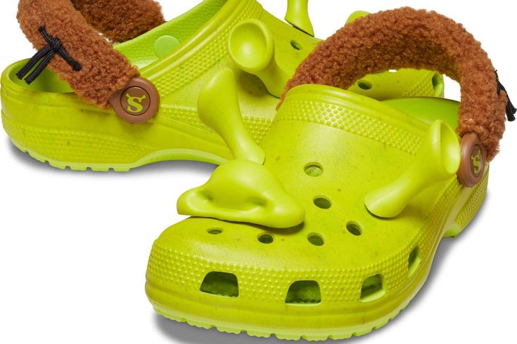 Fun Green Slip-on Clogs, Fun Green Round Toe Clogs, Green Round Toe Clogs With Fun Style, Green Synthetic Clogs For Beach, Green Synthetic Beach Clogs, Plastic Round Toe Clogs For Outdoor Use, Outdoor Plastic Clogs With Round Toe, Synthetic Clogs For Outdoor Activities In Spring, Fun Synthetic Clogs For The Beach