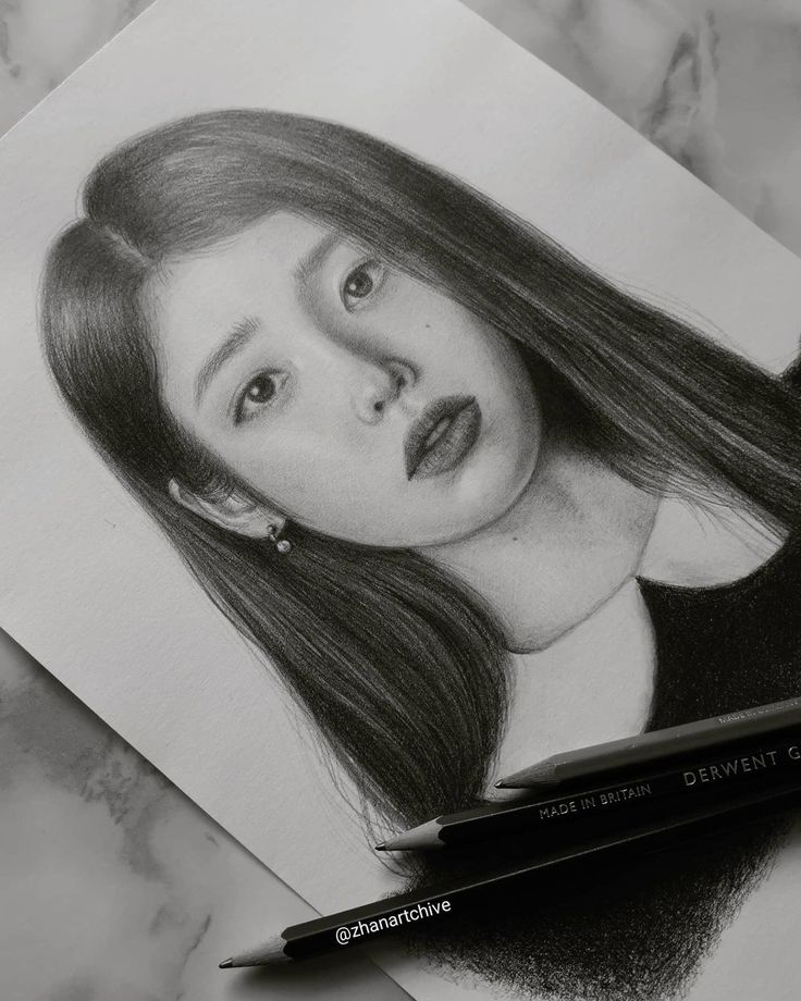 a pencil drawing of a girl with long hair