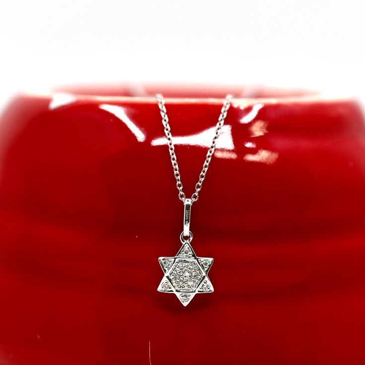 Star Of David Diamond And Gold Necklace 14k White Gold 0.16 Carat Diamonds Chain 16 Or 18 Inch Star Is 9.9mm By 1.1mm Sterling Silver Star Of David Necklace For Anniversary, Silver Star Of David Necklace For Formal Occasions, Formal Silver Star Of David Necklace, Formal Star-shaped White Gold Jewelry, Formal White Gold Star-shaped Jewelry, Formal White Gold Star Jewelry, Fine Jewelry White Gold Necklace With Star Charm, Sterling Silver Star Necklace With Diamond Accents, Elegant Star Of David Hallmarked Necklace