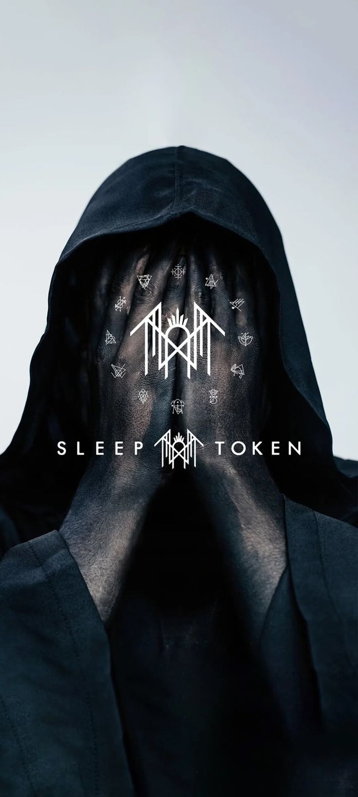 a man with his hands covering his face and the words sleep that token in front of him