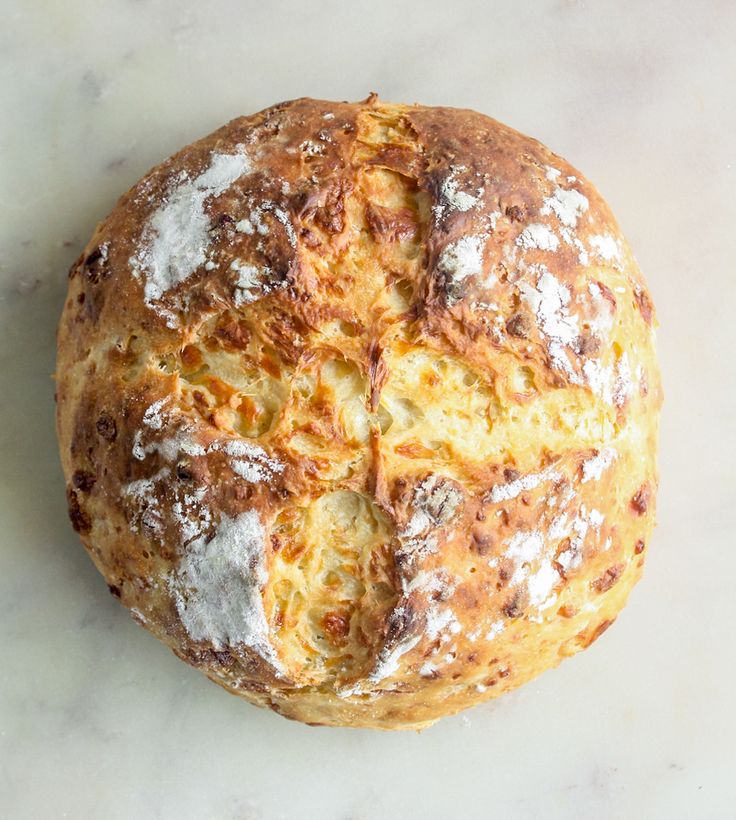 a loaf of bread sitting on top of a white counter