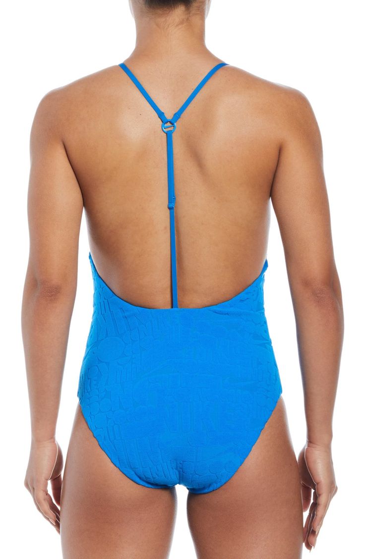 The flattering shape of this one-piece starts with a scoop neckline that gives way to an elongating T-strap design along the open back. T-strap back Full back coverage Lined 93% recycled polyester, 7% spandex Hand wash, line dry Imported Scoop Back Bodysuit With Solid Back For Poolside, Beach Bodysuit With Solid Scoop Back, Beach Bodysuit With Scoop And Solid Back, Fitted Blue Swimwear With Low Back, Blue Beachwear Bodysuit With Moderate Back Coverage, Beach Bodysuit With Scoop Back And Moderate Coverage, Nike Summer Pool Bodysuit, Blue Swimwear With Scoop Back For Swimming, Blue One-piece Swimwear With Solid Back