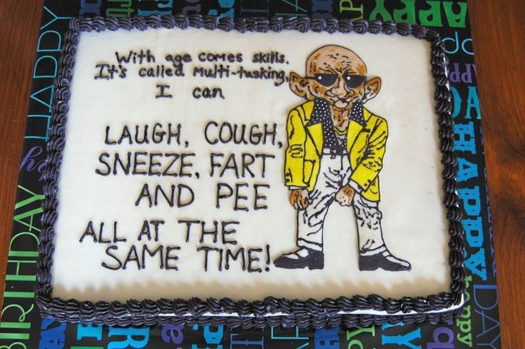 a birthday cake decorated with an image of a man in a yellow jacket and sunglasses