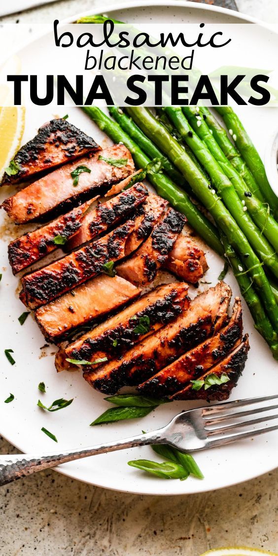 grilled salmon and asparagus on a white plate