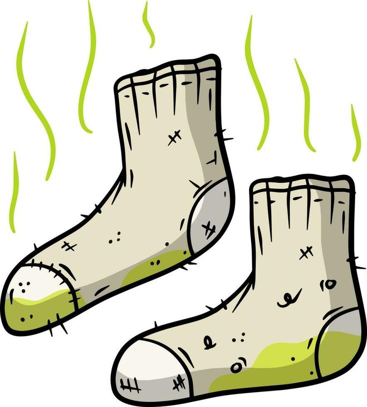 a pair of socks with spiky feet and green paint on the soles