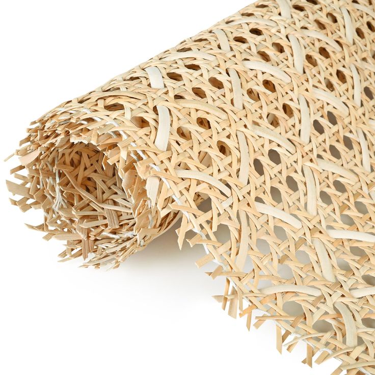 a roll of bamboo woven with holes in it