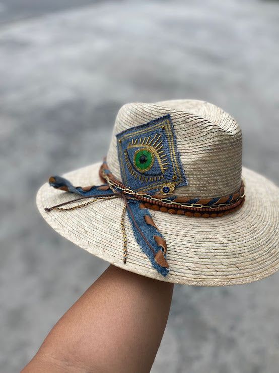 Unique palm hat embroidered by mexican artisans. Handmade of straw and beautifully embroidered by artisans in Mexico these hats are a must have if you want to stand of from the rest. They have an elastic band inside at the rim that makes them very comfortable and be worn from small to medium sizes. Dimensions: Small to Medium (54-55 cm *21 inches approx.) - (56-57 cm *22 inches approx.) Personalized Hats are made to order, allow 5 days to deliver. Handmade Fedora Panama Hat In Toquilla Straw, Bohemian Palm Leaf Hat Bands For Vacation, Bohemian Palm Leaf Hat Bands For Summer, Embroidered Straw Hat For Beach With Short Brim, Handmade Wide Brim Panama Hat In Toquilla Straw, Handmade Wide Brim Fedora In Toquilla Straw, Handmade Wide Brim Toquilla Straw Fedora, Artisan Woven Hat Bands For Summer, Artisan Straw Hats For Summer