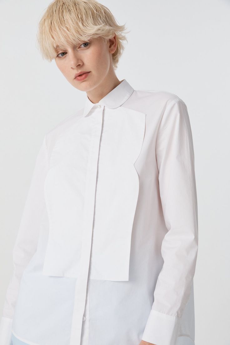 Boasting confidence and style, this uniquely designed shirt is a play on the classic dinner-shirt, with tuxedo style collar and front lapels. This long sleeved shirt has a concealed front button opening with a beautiful pearl button at the top of the placket. The back of the shirt has an inverted pleat for ease of wear. Relaxed fit silhouette. Model is wearing a Size AU 8 Open Collar Shirt, Garment Care Labels, Tuxedo Style, All Heart, Designer Label, Long Sleeved Shirt, Online Fashion Boutique, Wedding Outfits, Shirt Ideas