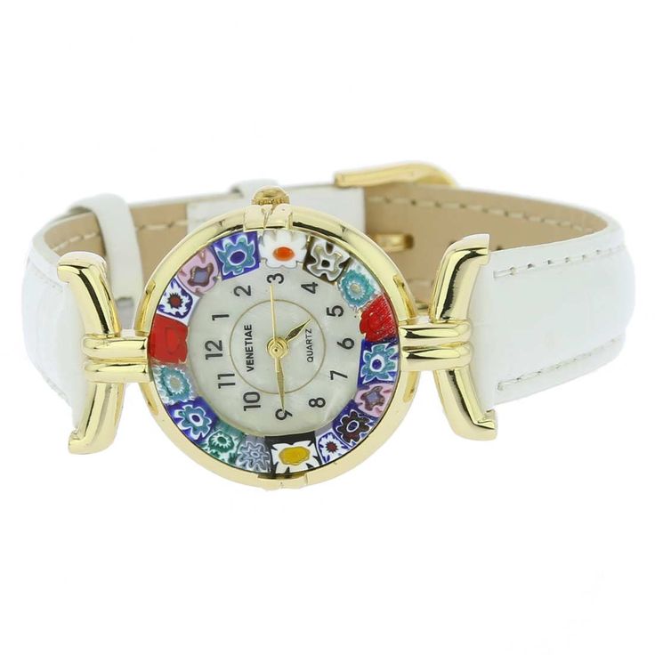 This elegant Murano glass watch is a unique timepiece featuring high-quality workmanship and the most famous Murano technique- Millefiori (a thousand flowers)- which has become a trademark of Murano glass making. Stylized flowers in beautiful colors grace the hand-made face of this watch and give it a trendy and unmistakably Venetian look. This Murano watch adds a perfect accent to any wardrobe and works equally well for your casual outing or a night on the town. The face of this Murano glass wa Luxury Multicolor Watches As Gift, Luxury Multicolor Watches For Gift, Luxury Multicolor Watches For Gifts, White Skeleton Dial Watch Accessories As Gift, Elegant Multicolor Round Dial Watches, Multicolor Round Watches For Gift, Multicolor Round Watches As Gifts, Elegant Multicolor Watches As Gifts, Elegant Multicolor Watches For Gifts