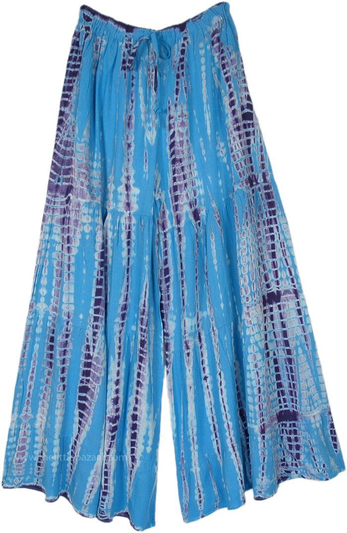 The turq blue tie-dye split skirt pants for women.  Perfect for those who want to stand out from the crowd, this unique piece blends two trends into one stunning garment. #tlb #SplitSkirtsPants #bohemianfashion #WideLegPants Blue Harem Pants For Summer, Blue Bohemian Full Length Pants, Bohemian Blue Bottoms For Summer, Bohemian Style Full Length Blue Pants, Blue Wide-leg Harem Pants For Summer, Summer Bohemian Blue Bottoms, Blue Bohemian Harem Pants For Spring, Blue Hippie Harem Pants For Spring, Blue Hippie Pants For Vacation