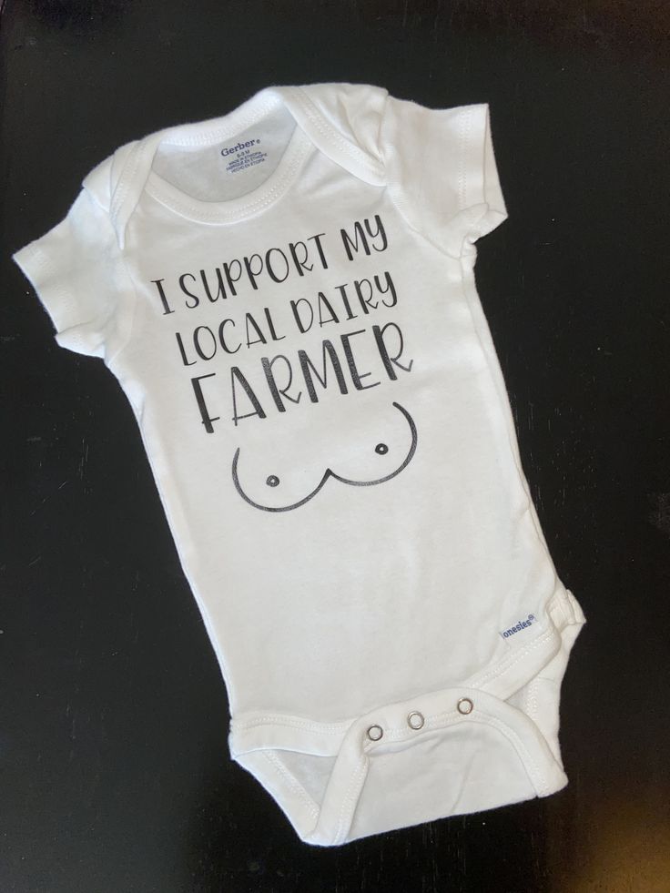 i support my local dairy farmer onesie on display at the store's booth