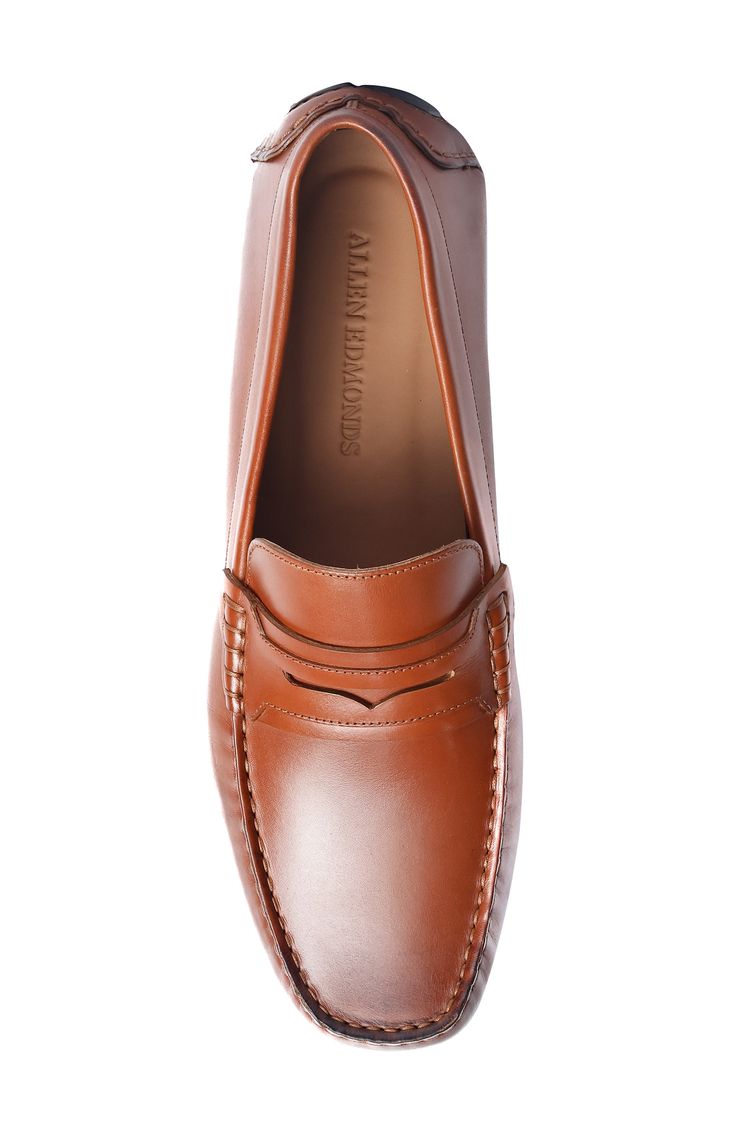 A classic penny keeper and antique finish lend timeless sophistication to a leather loafer with a nubby sole that will elevate your desk-to-dinner style. Leather upper and lining/rubber sole Imported Classic Cognac Moc Toe Loafers, Classic Cognac Slip-on Moccasins, Classic Moccasins With Branded Insole, Classic Leather Footbed Driving Loafers, Classic Driving Loafers With Leather Footbed, Classic Cognac Loafers For Formal Occasions, Classic Round Toe Driving Loafers, Classic Cognac Leather Slip-on Shoes, Classic Moc Toe Driving Loafers