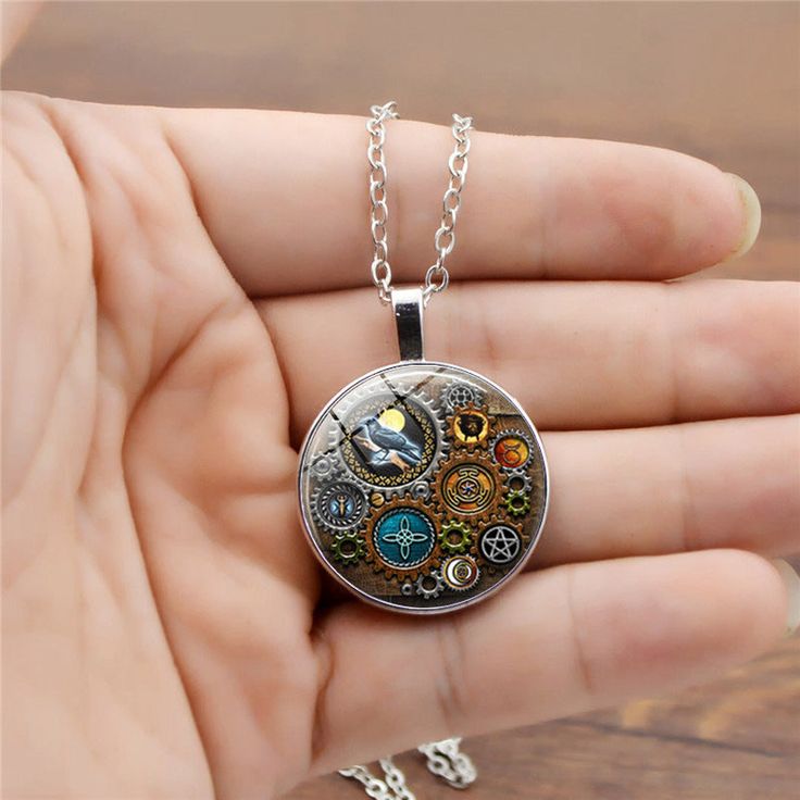 Introducing the Popular Steampunk Mechanical Time Stone Necklace! This fashion-forward statement piece is perfect for steampunk lovers, cosplayers, and industrial enthusiasts Its unique design features intricate Gear-like mechanisms, metallic accents, and beautiful Time Stones for a stylish impact. The necklace is constructed with an adjustable chain for a comfortable fit, while the Time Stones add a touch of personality. Whether for special occasions, costume events, or everyday looks, this Vic Steampunk Witch, Witch Pendant, Time Stone, Retro Sweater, Mens Gear, Gem Necklace, American Express, Metallic Accents, Chains Jewelry